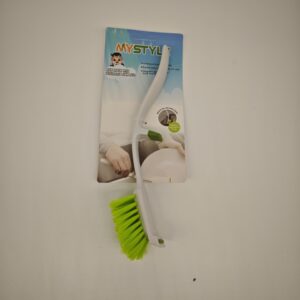 Dish brush with integrated sink rest